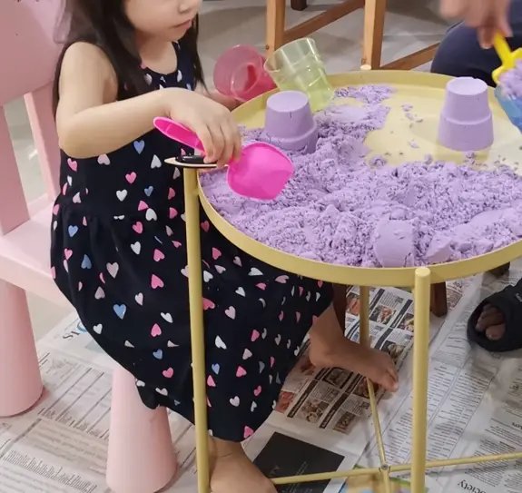 my 3 year old playing with kinetic sand