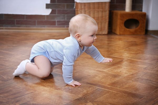 should i let my baby crawl on the hardwood floor